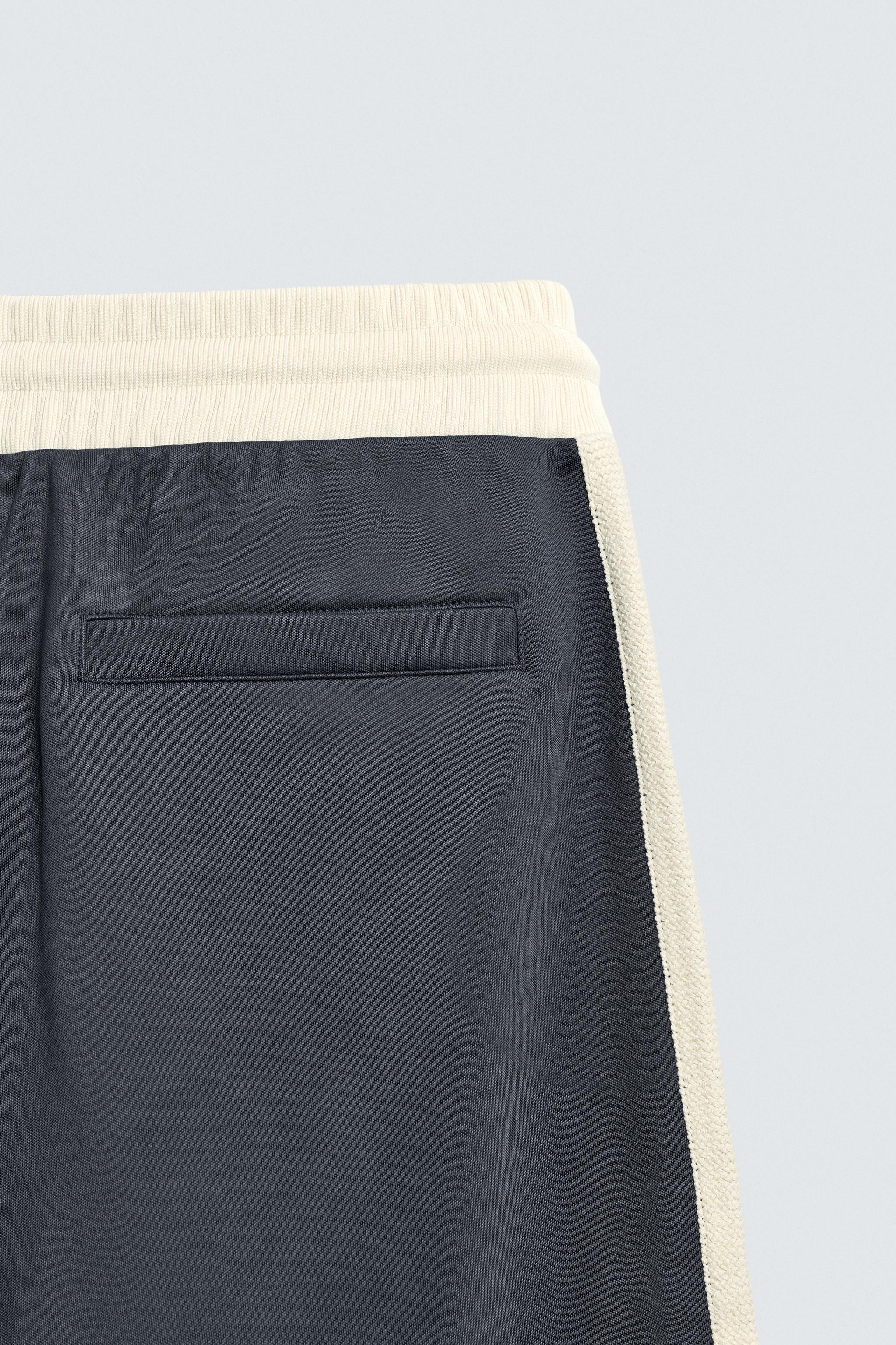 WIDE FIT JOGGER PANTS WITH STRIPES